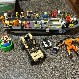 Lego lot. Mario. Boat. Biosyn genetics car. Minifigs